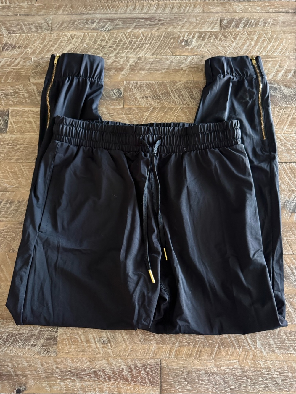 ZYIA Active Women's Black Stretch Jogger with Gold Accents